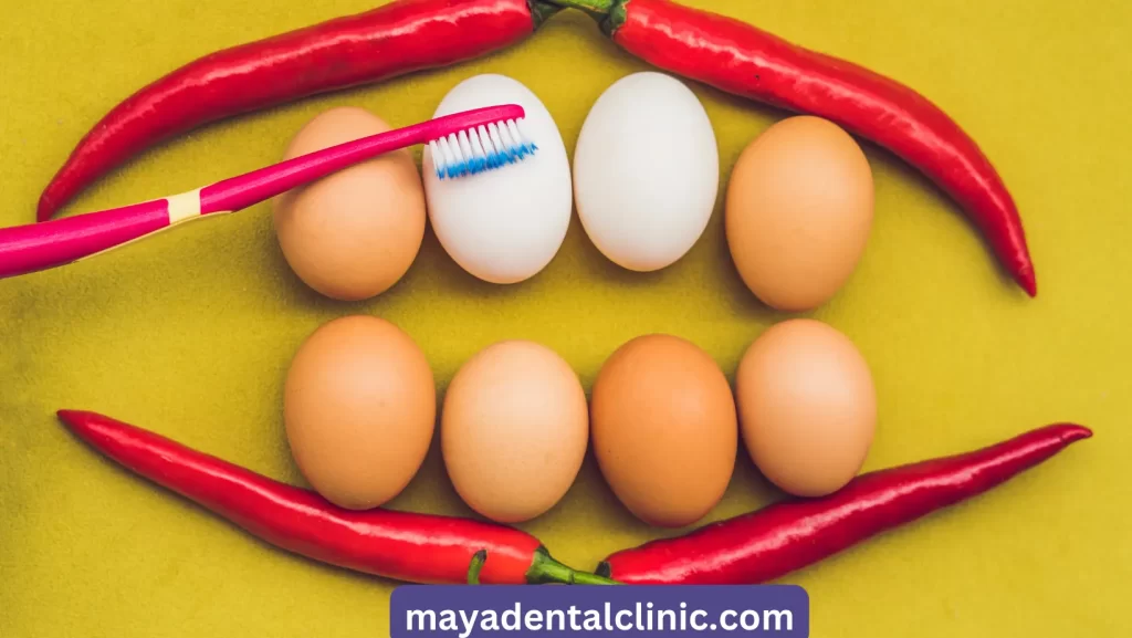 Eggs and red pepper in the form of a mouth with teeth
